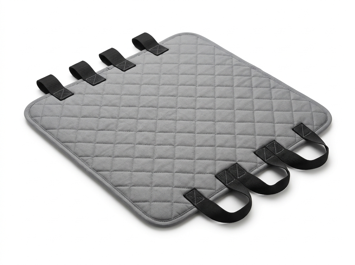 Positioning bed pad with handles